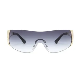 Lunettes de soleil futuristes Y2K sans monture avec détails dorés sertis de diamants brillants