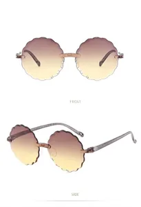 Front and side view of cute flower-shaped rimless sunglasses for kids.