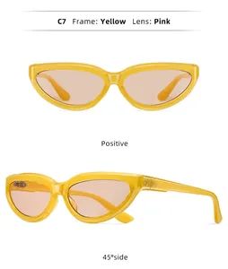 Vue détaillée de lunettes de soleil œil de chat rétro jaunes avec des verres roses.