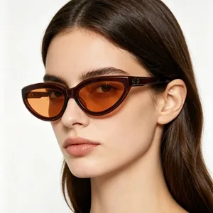 Lunettes de soleil vintage style œil de chat monture marron et verres orange élégants