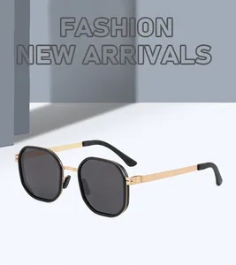 Retro polarized sunglasses featuring gold temples and stylish octagonal black frames