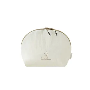 Minimalist white Taslan nylon travel storage pouch with zipper and printed quote