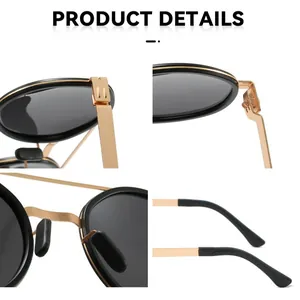 Vue macro détaillée de lunettes de soleil rondes polarisées pour hommes avec monture en métal doré