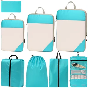 8-piece compression travel organizer set with aqua diamond pattern