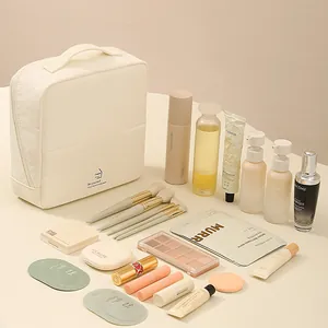 Large capacity solid color travel cosmetic storage bag with multi-layer dividers
