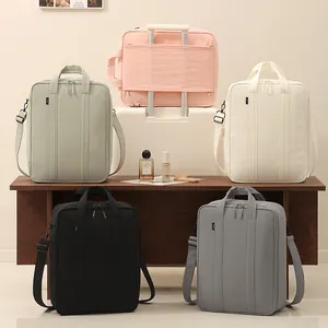 Large capacity travel bags with luggage sleeve in multiple colors for short trips.