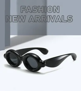 Close-up detail of stylish black funky bubble frog eye sunglasses with a glossy finish