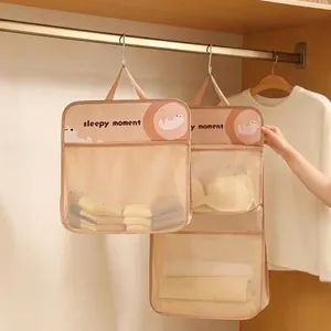 Hanging cartoon underwear storage bag with mesh pockets for closet organization
