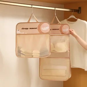 Hanging cartoon underwear and socks storage bag with mesh pockets for closet organization.
