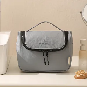 Trousse de toilette de voyage en nylon gris avec poignée et crochet