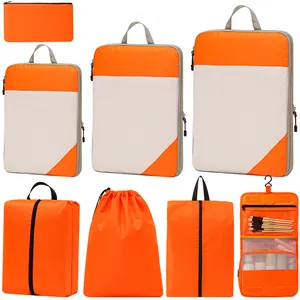 7-piece vibrant orange polyester compression travel packing cubes set with hanging toiletry bag