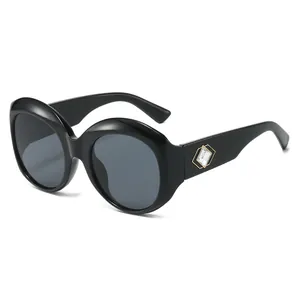 Stylish oversized round frame sunglasses with crystal temple detail in black finish