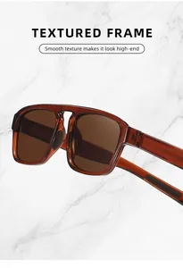 Detail of brown double bridge sunglasses featuring a smooth textured frame for men