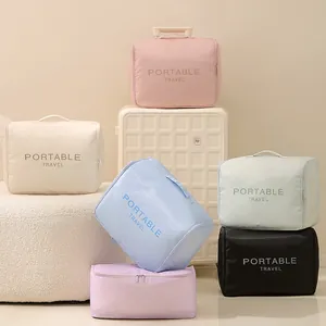 Multi-color portable hanging travel storage bags with foldable design for organized packing