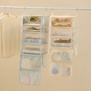Portable multifunctional foldable hanging closet organizer bag with mesh storage pockets