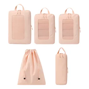 5-piece pink compression travel packing cube set with breathable mesh and drawstring bag