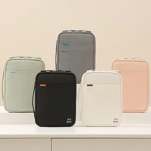 Water-resistant Taslon passport organizer bag in multiple colors for travel storage