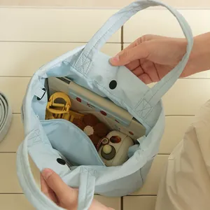Bolso de viaje Taslon azul claro de gran capacidad con cierre magnético, interior