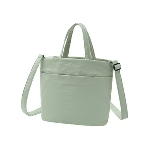 Bolso de viaje Taslon verde claro de gran capacidad con correa y asas de mano