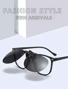Polarized flip-up sunglasses clip-on attached to a stylish black eyeglasses frame for driving