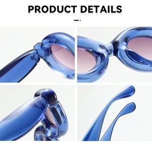 Detailed macro view of blue chunky bubble sunglasses with purple gradient lenses