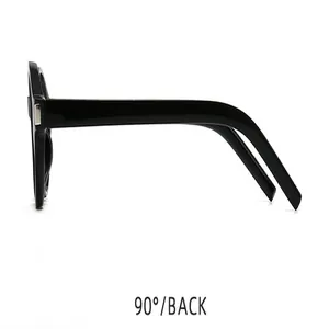 Détail du profil latéral de lunettes de soleil rétro noires avec accents métalliques