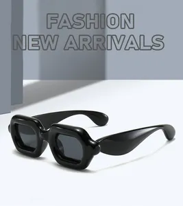 Detailed view of glossy black bubble thick frame sunglasses in retro Y2K style.