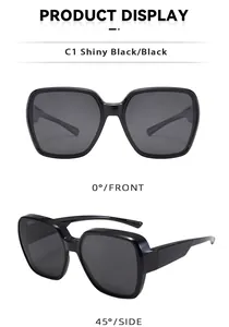 Vedute dettagliate frontale e laterale di occhiali da sole polarizzati neri oversize unisex con UV