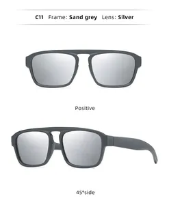 Detail view of men's double-bridge sunglasses in sand grey with silver lenses.
