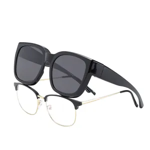 Polarized TR fit-over sunglasses for driving and sports, unisex black frame design.