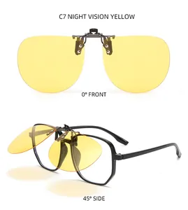 Detailed view of yellow night vision polarized clip-on sunglasses lenses on black frames