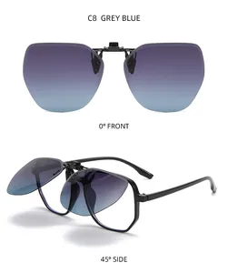 Close-up of flip-up polarized clip-on sunglasses with grey-blue gradient lenses
