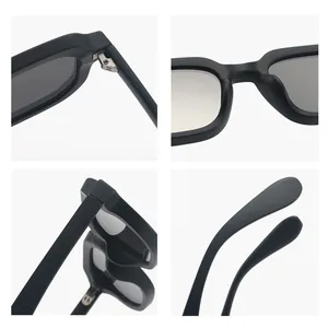 Vistas detalladas de gafas de sol cuadradas de color negro mate vintage con bisagras de metal