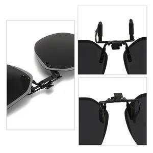 Rimless polarized flip-up clip-on sunglasses with polygonal lenses for driving