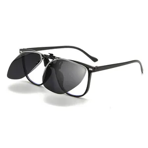Flip-up polarized sunglasses clip-ons for driving shown on a black glasses frame