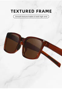 Close-up detail of high-end textured amber brown frame cycling sunglasses for outdoors