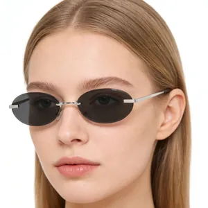 Gafas de sol Y2K sin montura para mujer con lentes ovaladas grises y montura plateada