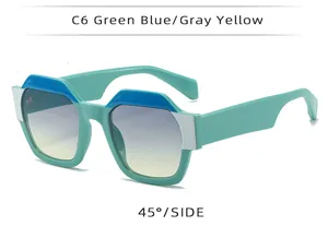 45-degree side view of polygon frame sunglasses with green and blue color block