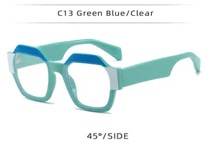 Geometric polygon glasses in teal blue and white shown from a 45 degree side view