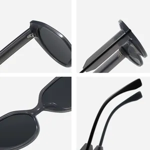 Lunettes de soleil polygonales surdimensionnées avec monture grise et anti-UV