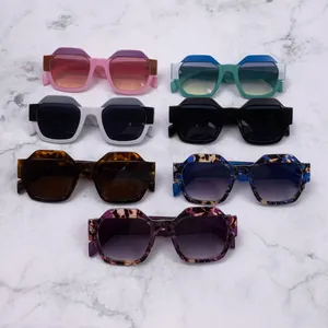 Trendy women's polygonal square frame sunglasses with various floral and solid patterns.