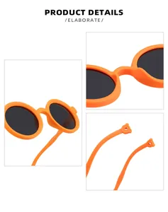 Close-up of orange round kids silicone sunglasses showing bridge and temple tips