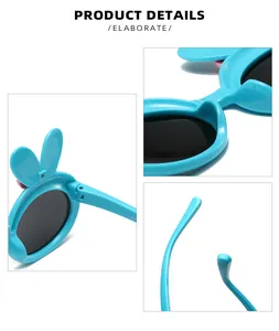 Detail view of blue children's sunglasses with cute rabbit ear design