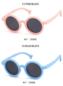 Detailed side view of round children's sunglasses in pink and blue silicone frames.