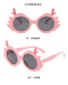 Front and side views of pink cartoon dragon horn children's sunglasses for kids.