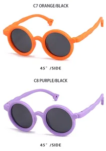 Side view of orange and purple round polarized sunglasses for kids with soft silicone frame