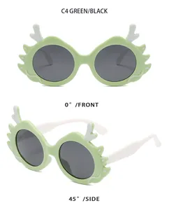 Mint green dragon horn sunglasses for kids with UV protection for fashion and travel