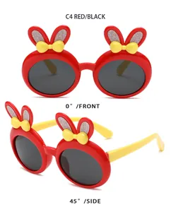 Front and side views of cute kids' polarized sunglasses with bunny ears and bows.