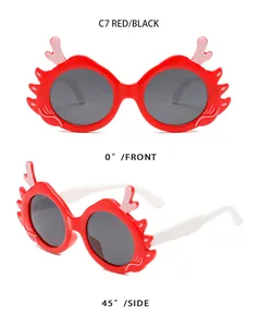 Detailed front and 45-degree side view of red cute cartoon dragon horn sunglasses for kids