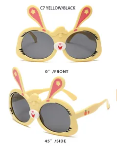 Detailed view of yellow rabbit-shaped kids sunglasses from front and side angles